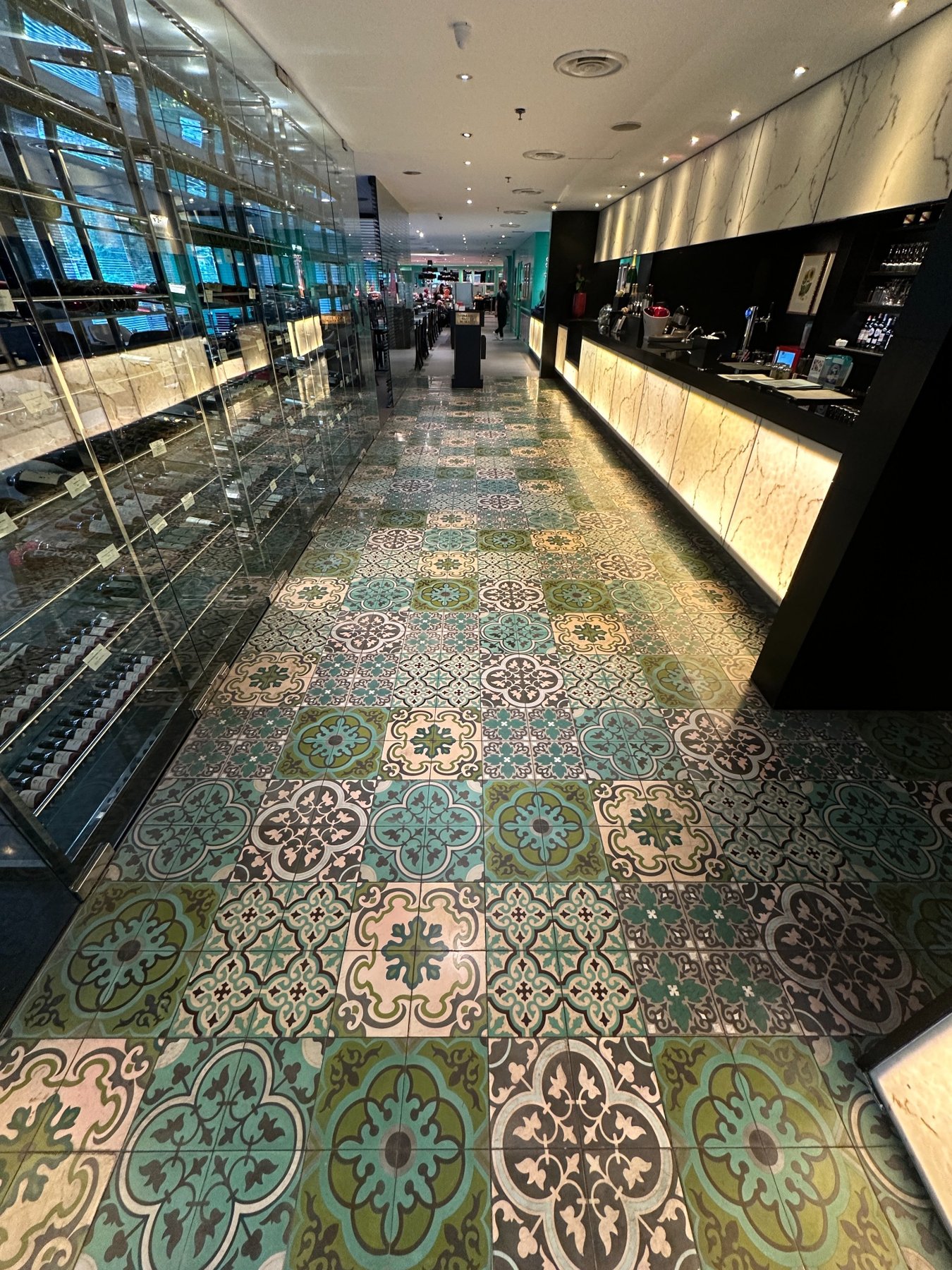 Decorative Peranakan floor tile patterns in a dining interior